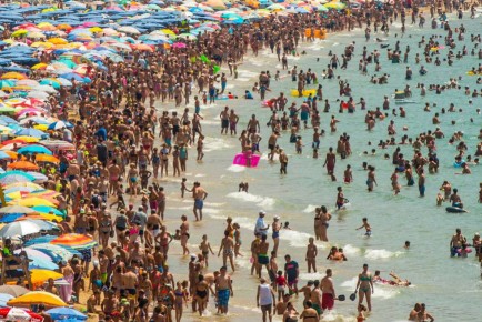 Awash with Brits: Spain's beaches, resorts, hotels and cities continue to attract UK holidaymakers - who are more than happy to spend.