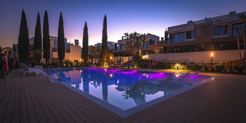 Swimming pool of Le Blanc at sunset