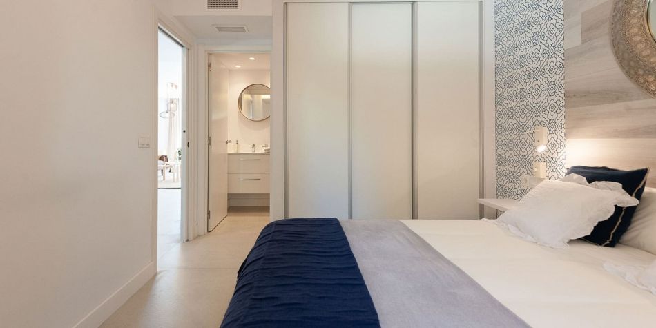 Side-on view of guest bedroom - La Perla de Riviera show flat